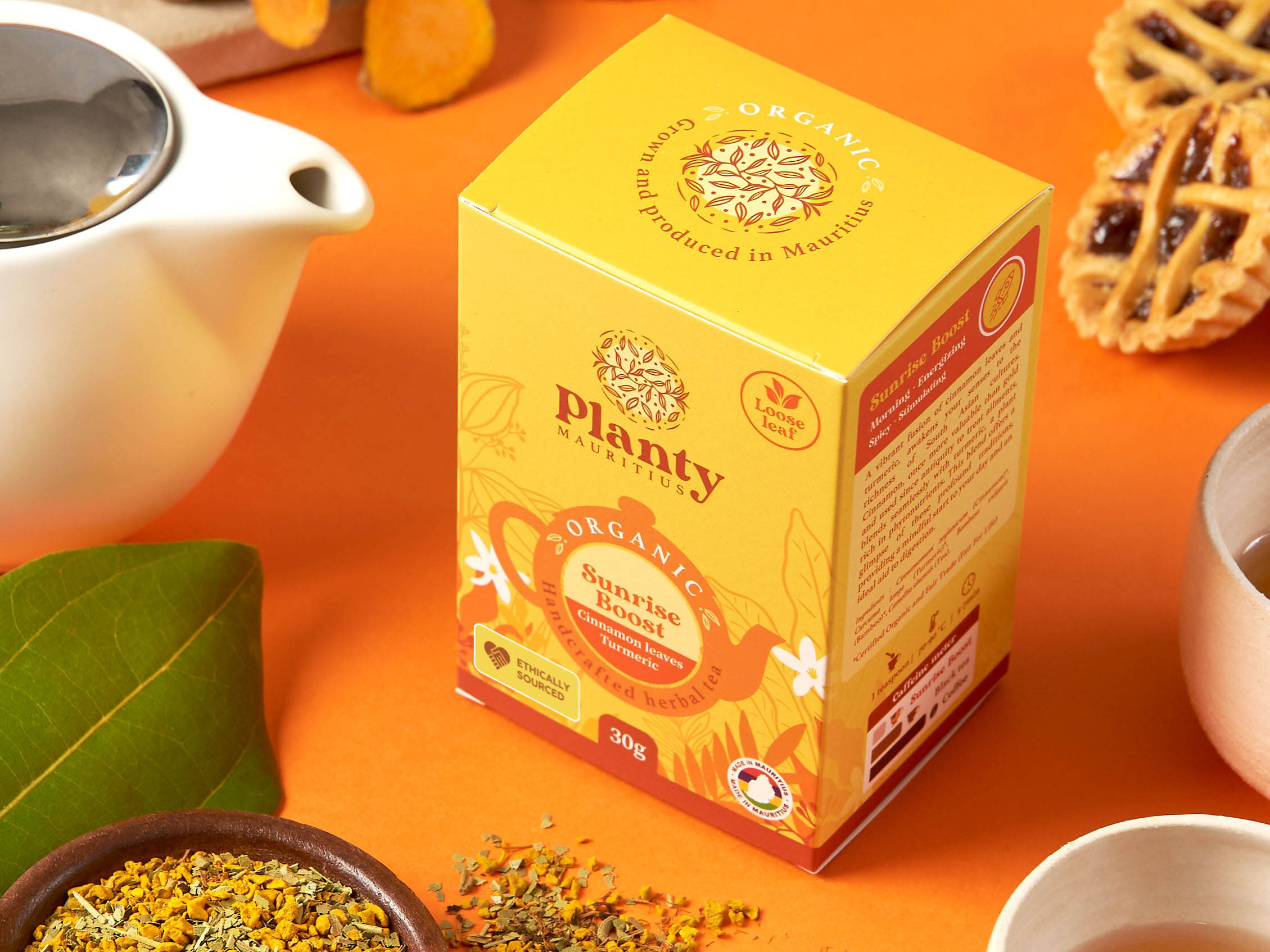 Cinnamon leaves and turmeric infusion on table